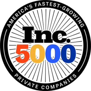 Circular badge with "Inc. 5000" in bold black, orange, yellow, and blue text. Surrounding text reads "America's Fastest-Growing Private Companies" with radial lines in the background.