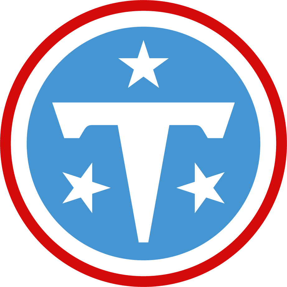 A blue circle with a large white “T” in the center, surrounded by three white stars and a red outer ring.